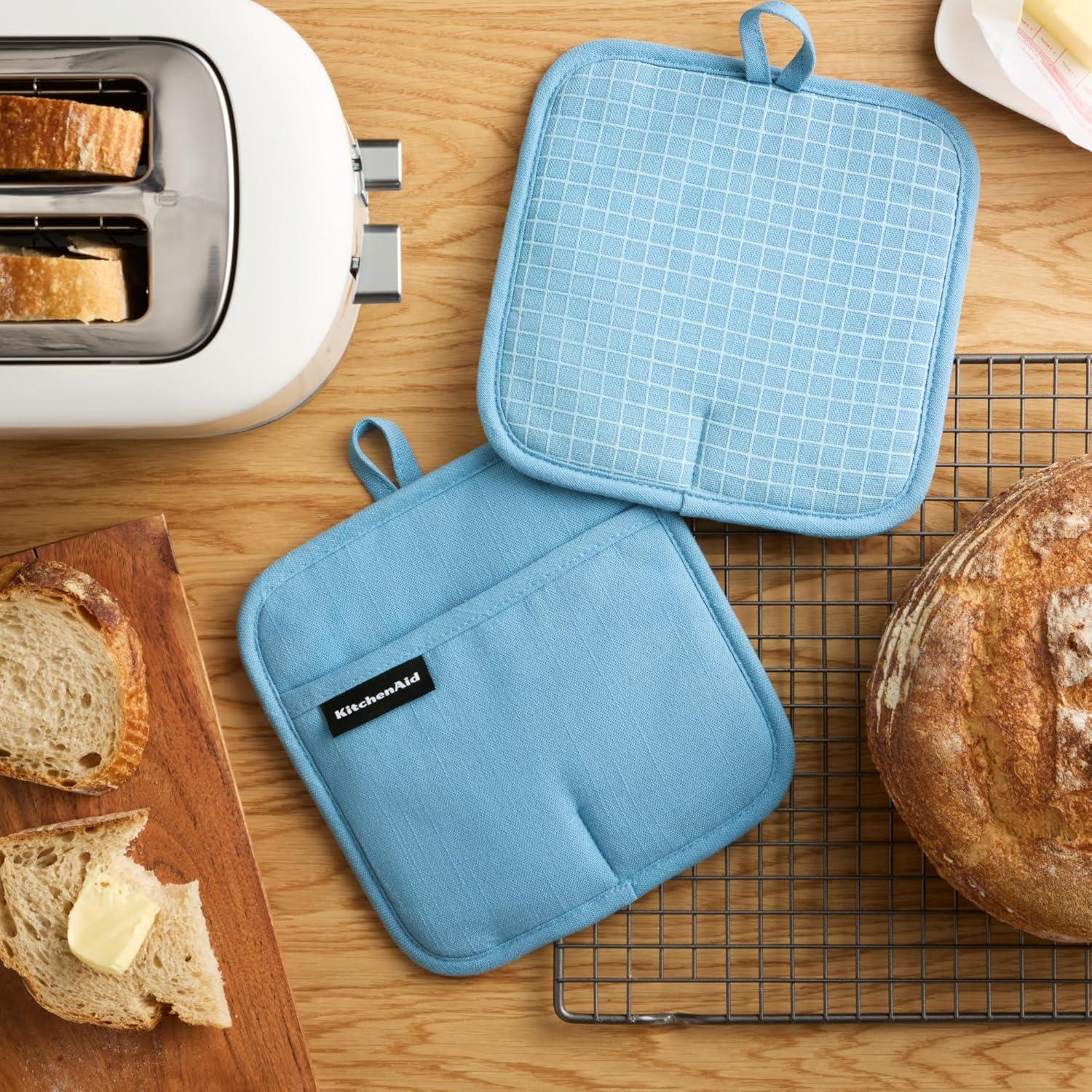 imageKITCHENAID Gourmet Series Gridlines Pot Holders 2Pack Set Heat Resistant up to 600F Soft Silicone Grip Magnetic Cuff Mineral Water Aqua 8x8Blue Velvet
